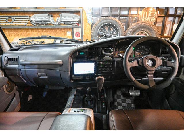 ランドクルーザー80 VXリミテッド 社外AW・MTタイヤ・社外マフラー・ブラウンレザー調シートカバー(16枚目)