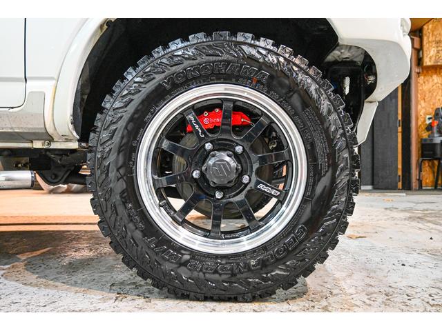 ジムニー クロスアドベンチャー ショックアブソーバー(タニグチ) サイドステップバー マフラー(タニグチ) タンクカバー(タニグチ) Defiメーター RAYS16インチホイール ヨコハマジオランダーMT(5枚目)