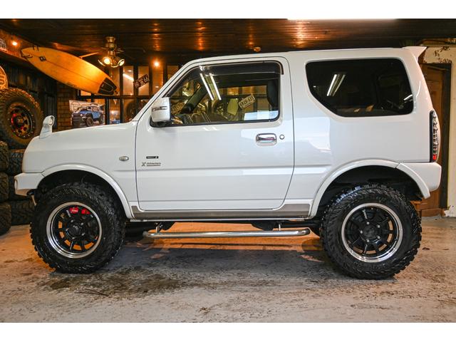 ジムニー クロスアドベンチャー ショックアブソーバー(タニグチ) サイドステップバー マフラー(タニグチ) タンクカバー(タニグチ) Defiメーター RAYS16インチホイール ヨコハマジオランダーMT(6枚目)