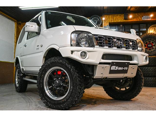 ジムニー クロスアドベンチャー ショックアブソーバー(タニグチ) サイドステップバー マフラー(タニグチ) タンクカバー(タニグチ) Defiメーター RAYS16インチホイール ヨコハマジオランダーMT(32枚目)