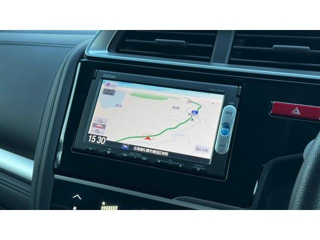 フィットハイブリッド Ｆパッケージ　４ＷＤ・エンジンスターター・ＥＴＣ・ドラレコ・純正ナビ・ＬＥＤドアミラーウィンカー・スマートキー（4枚目）