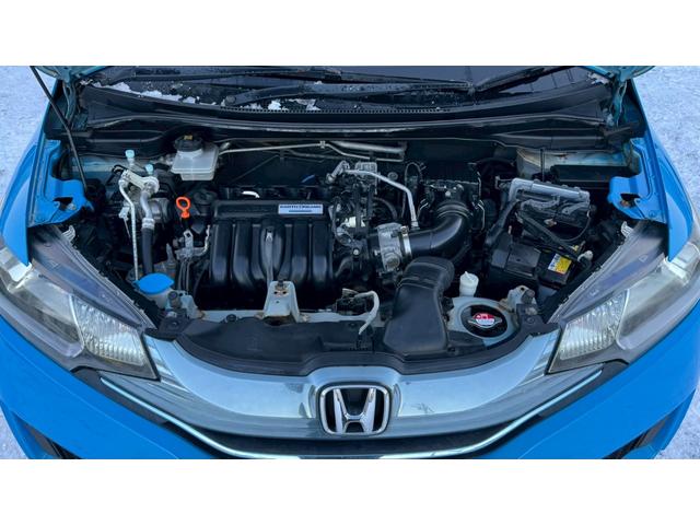 フィットハイブリッド Ｆパッケージ　４ＷＤ・エンジンスターター・ＥＴＣ・ドラレコ・純正ナビ・ＬＥＤドアミラーウィンカー・スマートキー（19枚目）