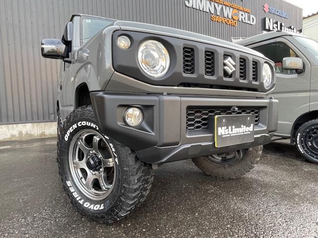 ジムニー XC 2インチリフトアップ(JAOS)/グラムライツ(レイズ)/オープンカントリーMT225(TOYO)/マッドフラップ(JAOS)/社外マフラー/シートカバー/(7枚目)