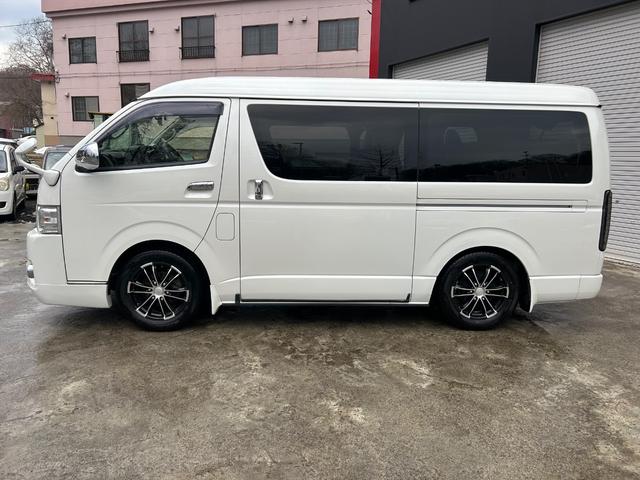 ハイエースワゴン ＧＬ　ファインテックツアラー　４ＷＤ　両側パワースライドドア　社外ナビ　ＴＶ　Ｂカメラ　フリップダウンモニター　フロントスポイラー　社外ＬＥＤテールランプ　シートカバー（7枚目）