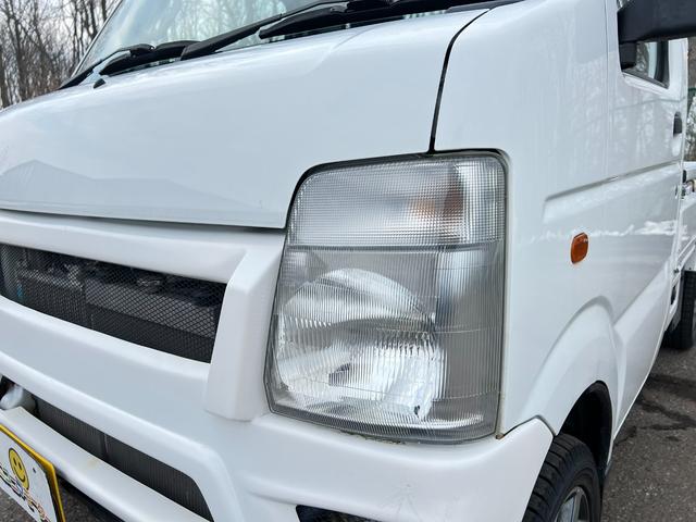 キャリイトラック KCエアコン・パワステ 3方開 4WD 車検R9年7月13日 走行2万キロ スタッドレス装着済 軽トラ オートマ エアコン パワステ 軽トラック 純正AW 冬タイヤ付 社外ディスプレイオーディオ エアロバンパー 修復歴なし(13枚目)