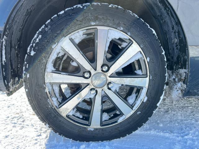 N-WGN G 4WD スタッドレス装着済 社外TV バックカメラ スマートキー プッシュスタート 横滑り防止 黒革シートカバー 社外AW ダンロップ 冬タイヤ付 両側シートヒーター 修復歴なし(8枚目)