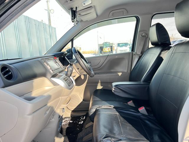 N-WGN G 4WD スタッドレス装着済 社外TV バックカメラ スマートキー プッシュスタート 横滑り防止 黒革シートカバー 社外AW ダンロップ 冬タイヤ付 両側シートヒーター 修復歴なし(9枚目)