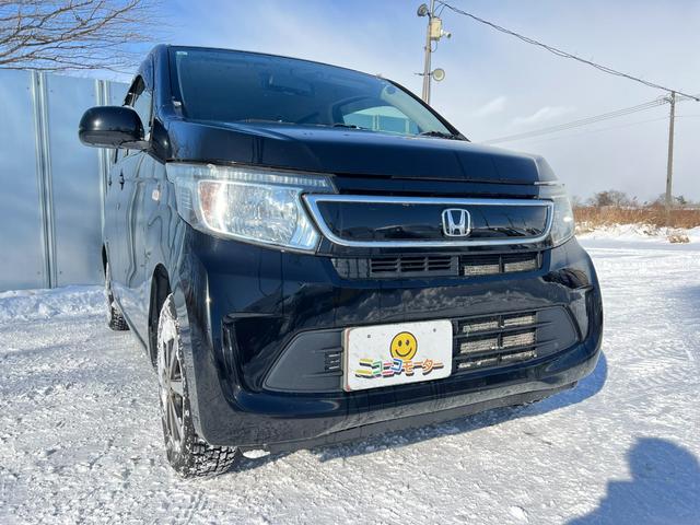 N-WGN G 4WD スタッドレス装着済 社外TV バックカメラ スマートキー プッシュスタート 横滑り防止 黒革シートカバー 社外AW ダンロップ 冬タイヤ付 両側シートヒーター 修復歴なし(12枚目)