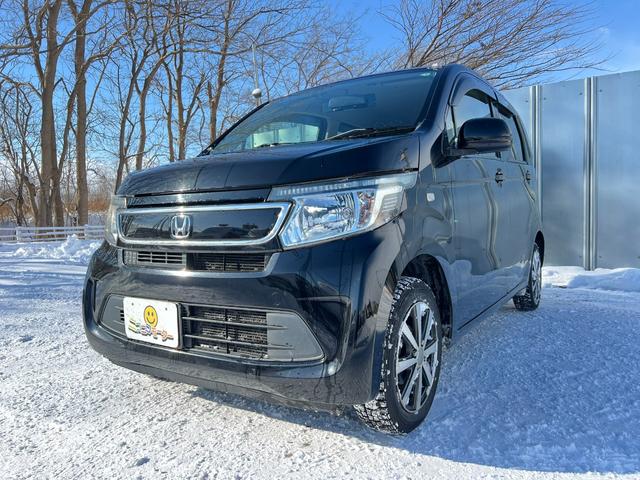 N-WGN G 4WD スタッドレス装着済 社外TV バックカメラ スマートキー プッシュスタート 横滑り防止 黒革シートカバー 社外AW ダンロップ 冬タイヤ付 両側シートヒーター 修復歴なし(15枚目)