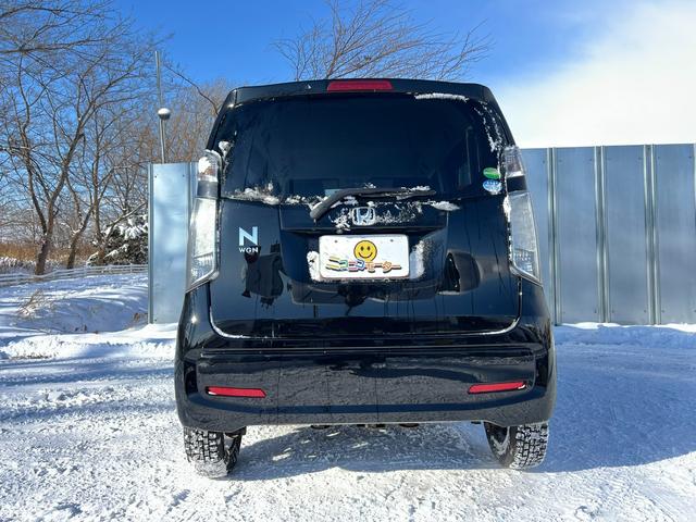N-WGN G 4WD スタッドレス装着済 社外TV バックカメラ スマートキー プッシュスタート 横滑り防止 黒革シートカバー 社外AW ダンロップ 冬タイヤ付 両側シートヒーター 修復歴なし(21枚目)