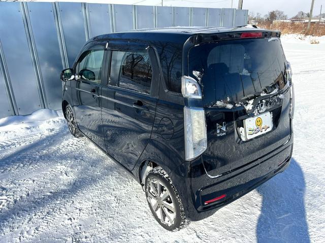 N-WGN G 4WD スタッドレス装着済 社外TV バックカメラ スマートキー プッシュスタート 横滑り防止 黒革シートカバー 社外AW ダンロップ 冬タイヤ付 両側シートヒーター 修復歴なし(23枚目)