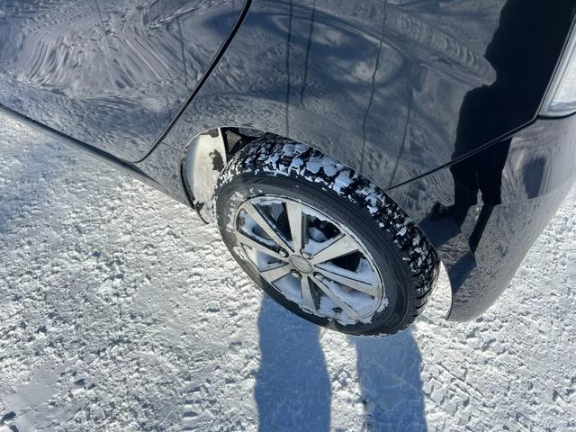 N-WGN G 4WD スタッドレス装着済 社外TV バックカメラ スマートキー プッシュスタート 横滑り防止 黒革シートカバー 社外AW ダンロップ 冬タイヤ付 両側シートヒーター 修復歴なし(26枚目)