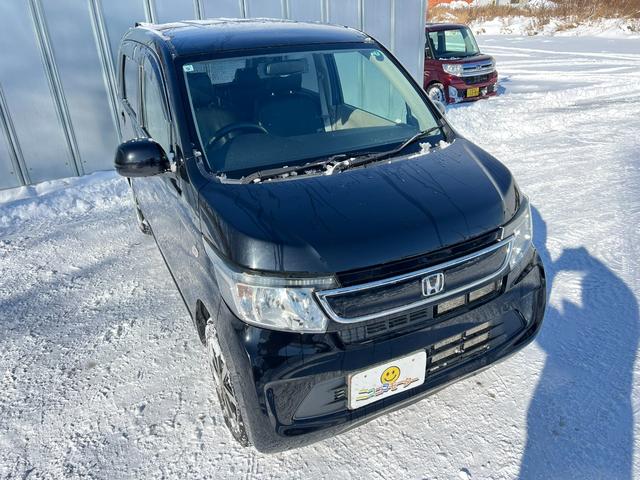 N-WGN G 4WD スタッドレス装着済 社外TV バックカメラ スマートキー プッシュスタート 横滑り防止 黒革シートカバー 社外AW ダンロップ 冬タイヤ付 両側シートヒーター 修復歴なし(32枚目)