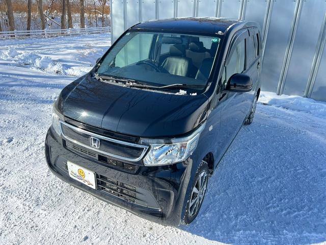 N-WGN G 4WD スタッドレス装着済 社外TV バックカメラ スマートキー プッシュスタート 横滑り防止 黒革シートカバー 社外AW ダンロップ 冬タイヤ付 両側シートヒーター 修復歴なし(36枚目)