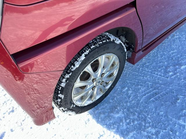 タント カスタムＲＳ　４ＷＤ　車検Ｒ９年３月１９日　ターボ　スタッドレス装着済　両側パワースライドドア　スマートキー　プッシュスタート　社外ディスプレイオーディオ　ブリヂストン　冬タイヤ　社外ＡＷ　エコアイドル　修復歴なし（10枚目）