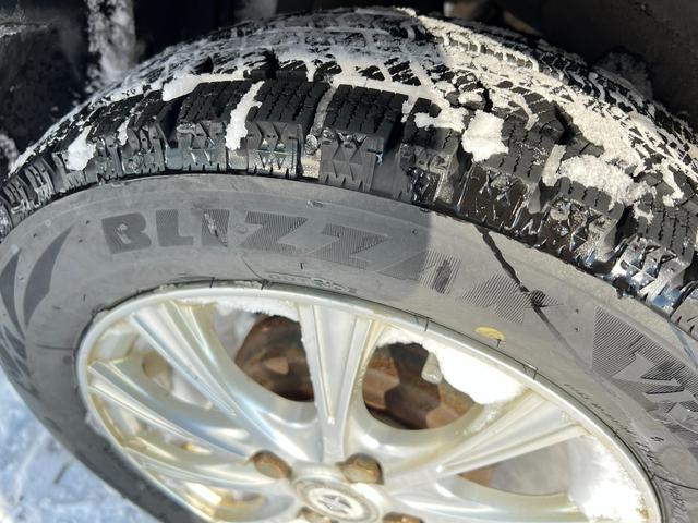 タント カスタムＲＳ　４ＷＤ　車検Ｒ９年３月１９日　ターボ　スタッドレス装着済　両側パワースライドドア　スマートキー　プッシュスタート　社外ディスプレイオーディオ　ブリヂストン　冬タイヤ　社外ＡＷ　エコアイドル　修復歴なし（12枚目）
