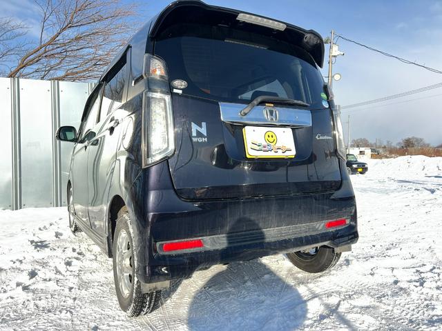 Ｎ－ＷＧＮカスタム Ｇ　４ＷＤ　車検Ｒ９年２月１８日　スタッドレス装着済　スマートキー　プッシュスタート　純正オーディオ　社外ＡＷ　冬タイヤ付　ＡＢＳ　横滑り防止　修復歴なし（7枚目）