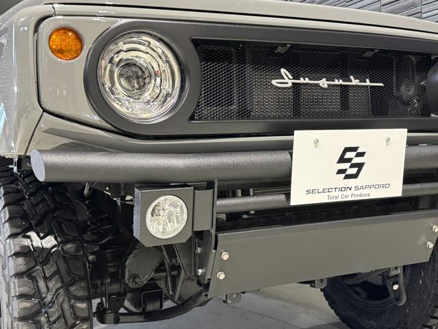 ジムニー ＸＣ　登録済未使用車　新品クラッツィオヴィンテージシートカバー　新品パイプＦ／Ｒバンパー　新品小型テールランプ　新品ナンバー移設キット　新品ホイールアピオワイルドボアＳＲ　新品タイヤトーヨーＲ／Ｔ（14枚目）