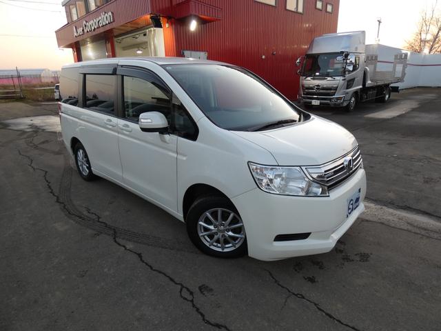 ステップワゴン Ｇ　ＨＩＤエディション　特別仕様車　４ＷＤ　両側パワースライドドア　ナビＴＶ　バックカメラ　走行距離９６７６９キロ　８人乗り　２０００ＣＣ　３列シート　フルフラットシート　エンジンスターター（4枚目）