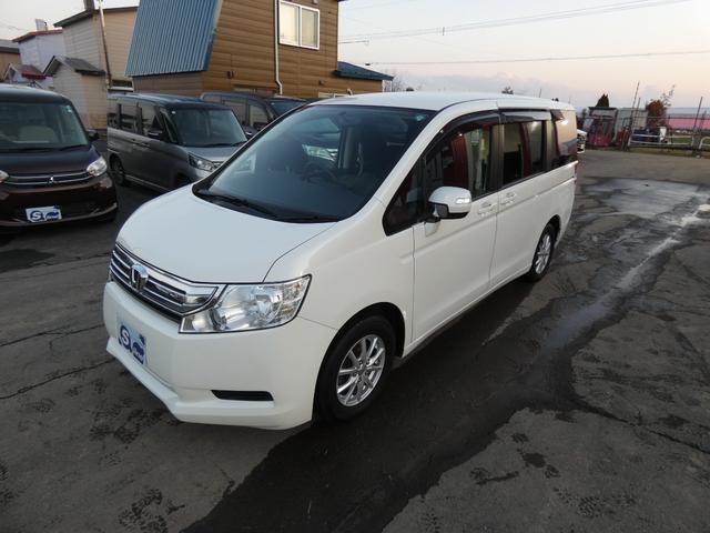 ステップワゴン Ｇ　ＨＩＤエディション　特別仕様車　４ＷＤ　両側パワースライドドア　ナビＴＶ　バックカメラ　走行距離９６７６９キロ　８人乗り　２０００ＣＣ　３列シート　フルフラットシート　エンジンスターター（7枚目）