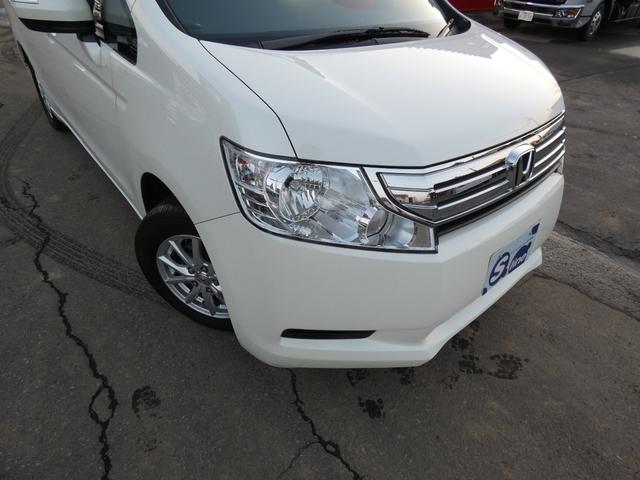 ステップワゴン Ｇ　ＨＩＤエディション　特別仕様車　４ＷＤ　両側パワースライドドア　ナビＴＶ　バックカメラ　走行距離９６７６９キロ　８人乗り　２０００ＣＣ　３列シート　フルフラットシート　エンジンスターター（9枚目）