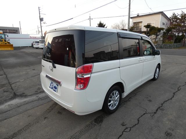 ステップワゴン Ｇ　ＨＩＤエディション　特別仕様車　４ＷＤ　両側パワースライドドア　ナビＴＶ　バックカメラ　走行距離９６７６９キロ　８人乗り　２０００ＣＣ　３列シート　フルフラットシート　エンジンスターター（10枚目）
