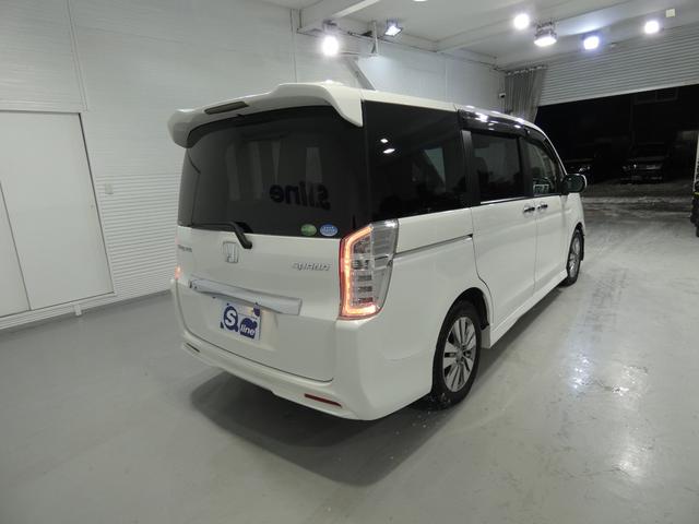 ステップワゴンスパーダ Z インターナビセレクション 寒冷地仕様 8人乗り 両側パワースライドドア フリップダウンモニター フルセグナビ バックカメラ フルフラットシート 車検令和9年12月 クルーズコントロール 4WD(12枚目)