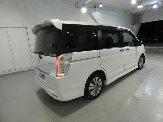 ステップワゴンスパーダ Z インターナビセレクション 寒冷地仕様 8人乗り 両側パワースライドドア フリップダウンモニター フルセグナビ バックカメラ フルフラットシート 車検令和9年12月 クルーズコントロール 4WD(13枚目)