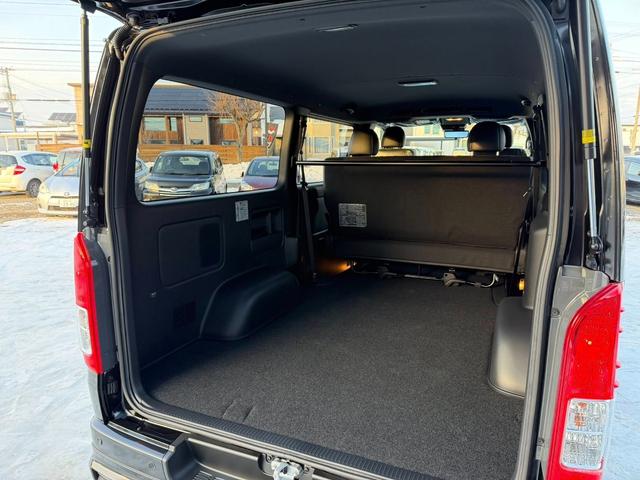 ハイエースバン ロングスーパーＧＬ　ダークプライムＳ　４ＷＤ　両側パワスラ　デジタルインナーミラー　フロアマット　ＥＴＣ　ＬＥＤヘッド　モデリスタフルエアロ　コンビハンドル　ハーフレザーシート　オートマチックハイビーム（26枚目）