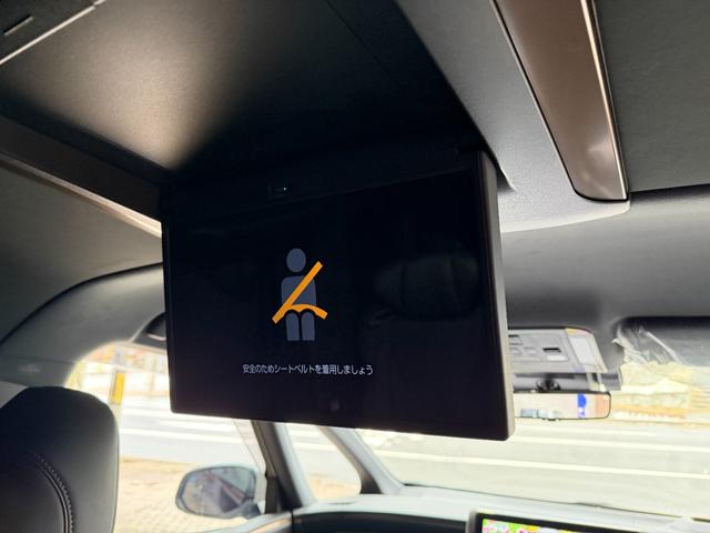 ヴェルファイアハイブリッド Z プレミア 寒冷地仕様 ムーンルーフ フリップダウンモニタ デジタルインナーミラー 電動サンシェード ヘッドアップディスプレイ パノラミックビュー全方位モニタ アドバンスドパークリモート機能付き ブラインドモニタ(65枚目)