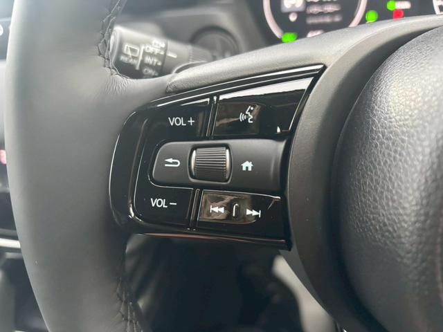 ヴェゼル ｅ：ＨＥＶ　Ｚ　届出済未使用車　４ＷＤ　純正９インチディスプレイ　Ｂｌｕｅｔｏｏｔｈ　アラウンドビューモニター　寒冷地仕様　パワーバックドア　ブラインドスポットモニター　クルコン　レーンアシスト　クリアランスソナー（27枚目）