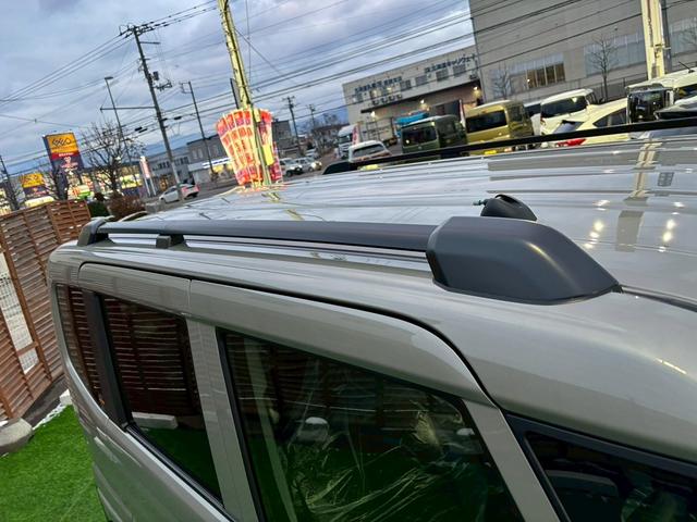 スペーシアギア ハイブリッドXZ ターボ 4WD 登録済未使用車 ディスプレイオーディオ フルセグTV ルーフレール 両側自動ドア アラウンドビュー BT 衝突軽減 コーナーセンサー レーンアシスト シート・ハンドルヒーター 保証書 スペアキ(39枚目)