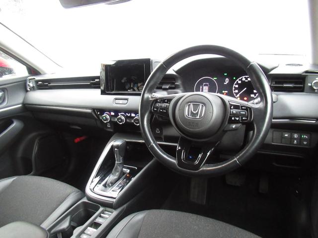 ヴェゼル ｅ：ＨＥＶＺ　純正ＥＴＣ付・純正エンジンスタータ・オーディオレス・運転席助手席シートヒーター・パワーテールゲート・ブラインドスポットインフォメーション・親水／ヒーテッドドアミラー＋熱線入りフロントウインドウ（18枚目）