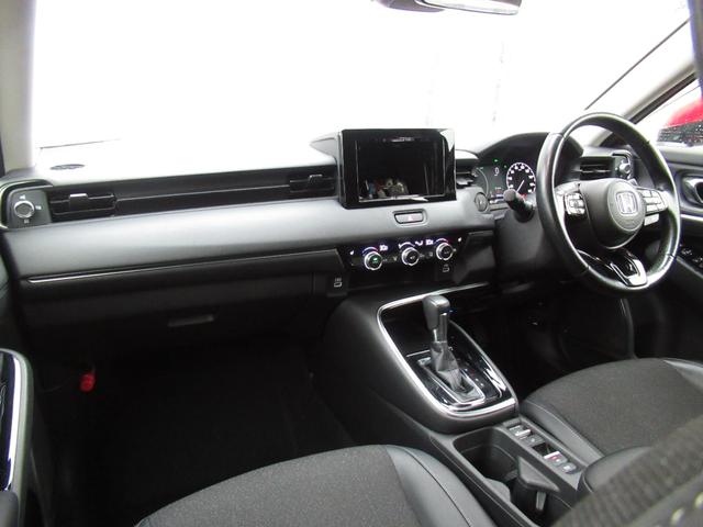 ヴェゼル ｅ：ＨＥＶＺ　純正ＥＴＣ付・純正エンジンスタータ・オーディオレス・運転席助手席シートヒーター・パワーテールゲート・ブラインドスポットインフォメーション・親水／ヒーテッドドアミラー＋熱線入りフロントウインドウ（20枚目）