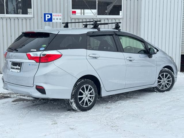 シャトル ハイブリッドＸ　ホンダセンシング　１年距離無制限保証付・本州仕入・純正ナビ・Ｂカメラ・ＴＶ・ＬＥＤヘッドライト・ＥＴＣ・ハーフレザー・コンフォートビューパッケージ・シートヒーター・スマートキー（8枚目）