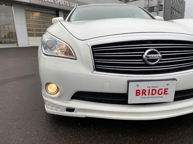 フーガ ３７０ＧＴ　ＦＯＵＲ　４ＷＤ／社外スポイラー／社外２０インチアルミホイール／ハーフレザーシート／ローダウン／純正ナビゲーション／バックモニター／ＥＴＣ／パワーオットマン／（35枚目）