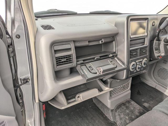 キューブ １４ＲＳ　ＦＯＵＲ　４ＷＤ　ナビ　ＴＶ　スマートキー　キーレスエントリー　電動格納ミラー　フルフラット　ベンチシート　ＡＴ　アルミホイール　ＣＤ　ＤＶＤ再生　衝突安全ボディ　ＡＢＳ　エアコン　パワーステアリング（14枚目）