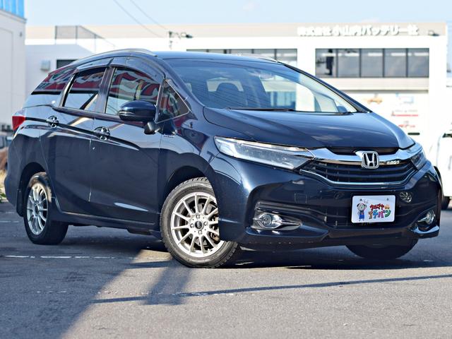 シャトル ハイブリッドＺ　サイドエアバッグ　スマキー　メモリーナビ　キーレスエントリー　ドラレコ　ＬＥＤライト　エアコン　エアバッグ　シートヒーター　アイドリングストップ　アルミホイール　横滑り防止装置　ルーフレール　ナビ（12枚目）