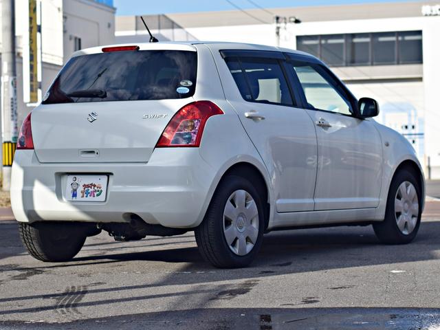 スイフト １．３ＸＧ　パワステ　盗難防止装置　運転席エアバッグ　４ＷＤ　スマートキー　ＡＢＳ　パワーウィンドウ　エアコン付き　キーレスキー　前席シートヒーター　Ｗエアバック（10枚目）