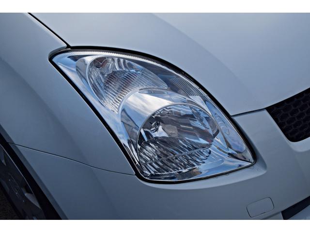 スイフト １．３ＸＧ　パワステ　盗難防止装置　運転席エアバッグ　４ＷＤ　スマートキー　ＡＢＳ　パワーウィンドウ　エアコン付き　キーレスキー　前席シートヒーター　Ｗエアバック（14枚目）