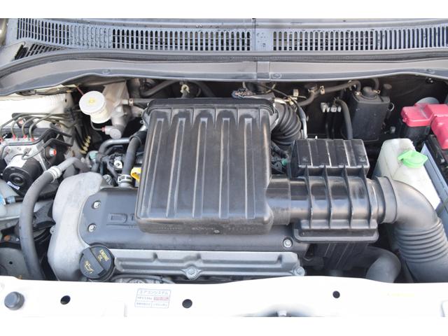 スイフト １．３ＸＧ　パワステ　盗難防止装置　運転席エアバッグ　４ＷＤ　スマートキー　ＡＢＳ　パワーウィンドウ　エアコン付き　キーレスキー　前席シートヒーター　Ｗエアバック（18枚目）