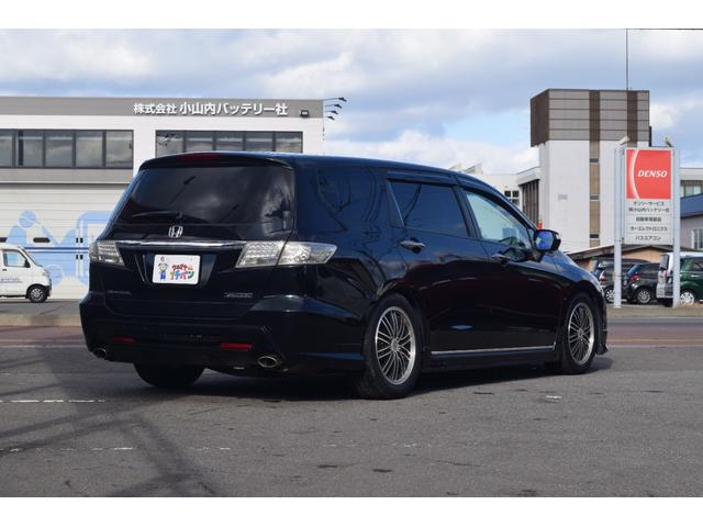 オデッセイ アブソルート　オートクルーズ　アルミ付　地デジＴＶ　キーレスエントリー　ナビＴＶ　三列シート　ＤＶＤ再生　エアコン　パワーウィンドウ　４ＷＤ　ＨＤＤナビ　ＡＢＳ　盗難防止システム　エアバッグ　パワーステアリング（6枚目）