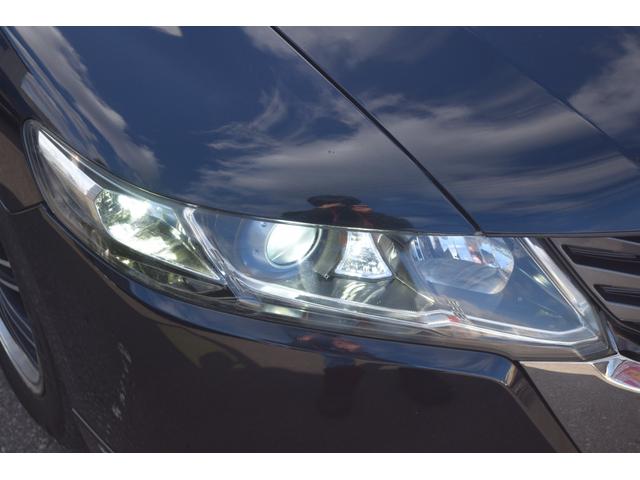 オデッセイ アブソルート　オートクルーズ　アルミ付　地デジＴＶ　キーレスエントリー　ナビＴＶ　三列シート　ＤＶＤ再生　エアコン　パワーウィンドウ　４ＷＤ　ＨＤＤナビ　ＡＢＳ　盗難防止システム　エアバッグ　パワーステアリング（10枚目）