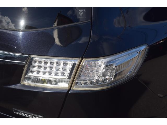 オデッセイ アブソルート　オートクルーズ　アルミ付　地デジＴＶ　キーレスエントリー　ナビＴＶ　三列シート　ＤＶＤ再生　エアコン　パワーウィンドウ　４ＷＤ　ＨＤＤナビ　ＡＢＳ　盗難防止システム　エアバッグ　パワーステアリング（13枚目）