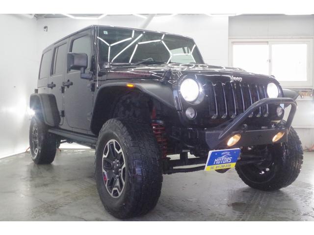 ジープ・ラングラーアンリミテッド ルビコン　ハードロック　４ＷＤ／当社社有車／特別仕様車／事故無／リフトアップ／カスタムオーバーフェンダー／ＵＳサイドマーカー／アクスルロック／スウェイバー／レザーシート／シートヒーター／テールレンズガード／社外ナビ／フルセグ（8枚目）