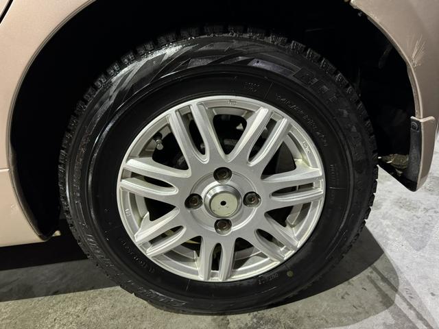 Ｌ　４ＷＤ　キーレスエントリー　電動格納ミラー　ＡＴ　盗難防止システム　ＣＤ　アルミホイール　衝突安全ボディ　エアコン　パワーステアリング(29枚目)