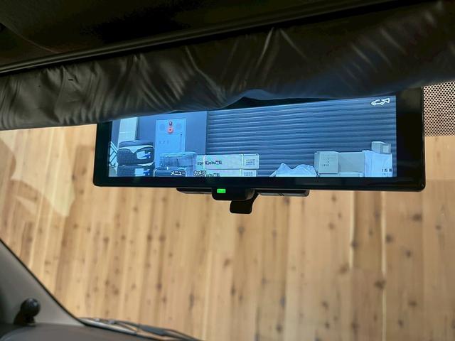 キャラバン グランドプレミアムＧＸ　マイルーム　ベッドキット　レクセル１６インチホイール　オープンカントリー純正７インチＳＤナビ　デジタルインナーミラー　片側パワースライドドア　前席シートヒーター　アラウンドビューモニター（7枚目）