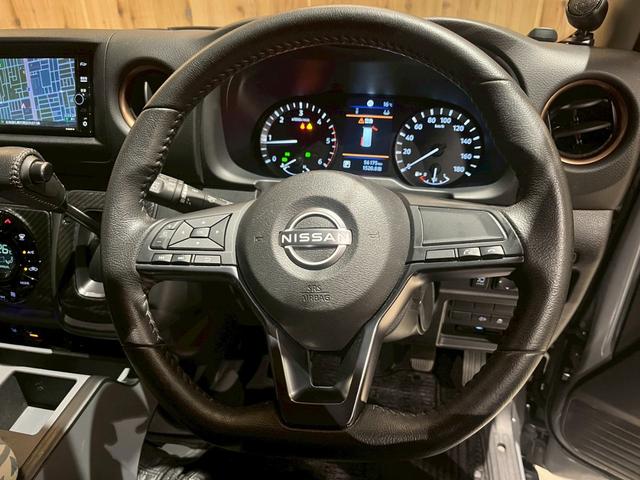 キャラバン グランドプレミアムＧＸ　マイルーム　ベッドキット　レクセル１６インチホイール　オープンカントリー純正７インチＳＤナビ　デジタルインナーミラー　片側パワースライドドア　前席シートヒーター　アラウンドビューモニター（20枚目）