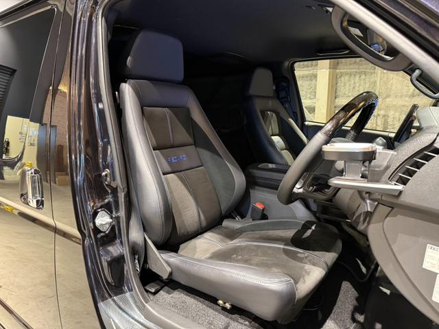 ハイエースバン スーパーGL ダークプライムII 1インチリフトアップ オーバーフェンダー TRDフロントバンパーガーニッシュ ベッドキット スライドトレイ レカロシート 10インチフローティングSDナビ アラウンドビューモニター 両側Pスライドドア(8枚目)