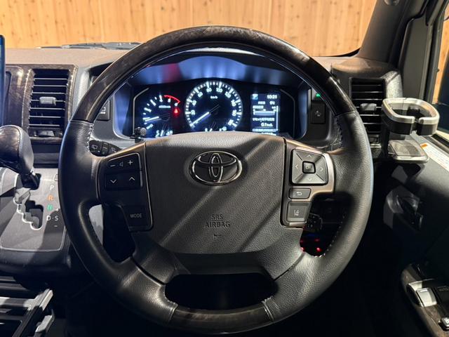 ハイエースバン スーパーGL ダークプライムII 1インチリフトアップ オーバーフェンダー TRDフロントバンパーガーニッシュ ベッドキット スライドトレイ レカロシート 10インチフローティングSDナビ アラウンドビューモニター 両側Pスライドドア(11枚目)